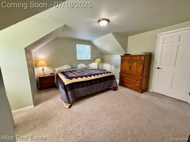 8354 Ridge Rd, Goodrich, MI 48438 - bedroom featuring carpet flooring and vaulted ceiling