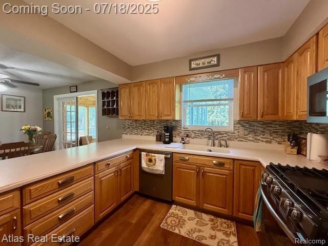 8354 Ridge Rd, Goodrich, MI 48438 - kitchen with stainless steel appliances, healthy amount of natural light, and tasteful backsplash