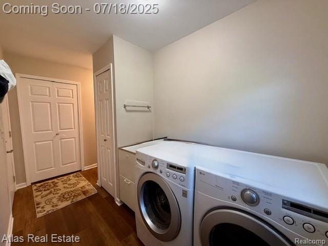 8354 Ridge Rd, Goodrich, MI 48438 - laundry room featuring washer and clothes dryer and dark wood-style flooring