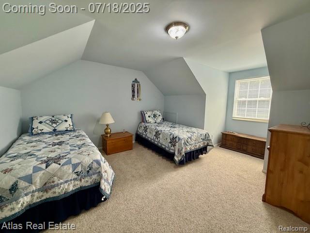 8354 Ridge Rd, Goodrich, MI 48438 - carpeted bedroom with lofted ceiling
