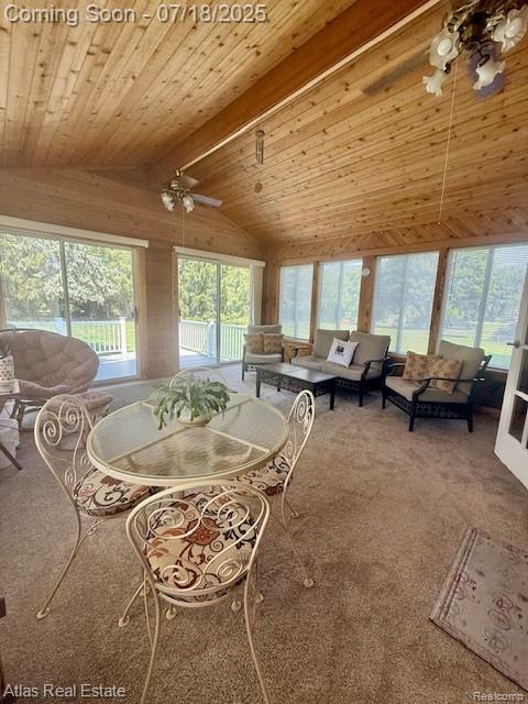8354 Ridge Rd, Goodrich, MI 48438 - dining space featuring ceiling fan, healthy amount of natural light, carpet flooring, and wood ceiling
