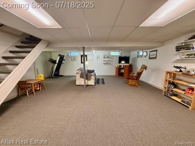 8354 Ridge Rd, Goodrich, MI 48438 - basement with a drop ceiling, stairs, and carpet flooring