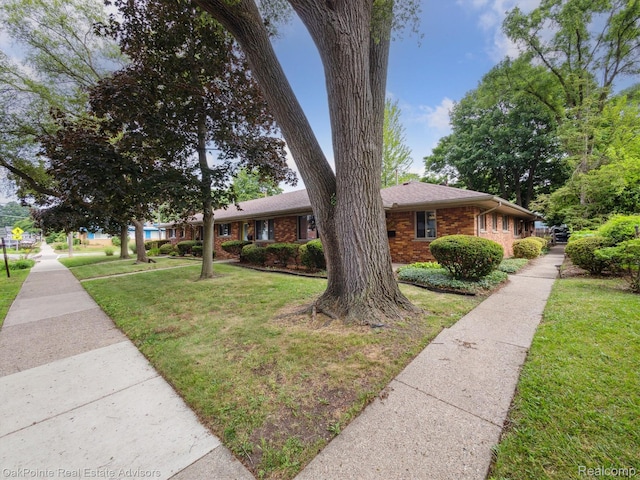 1010 Laprairie St, Ferndale, MI 48220 - single story home featuring brick siding and a front yard