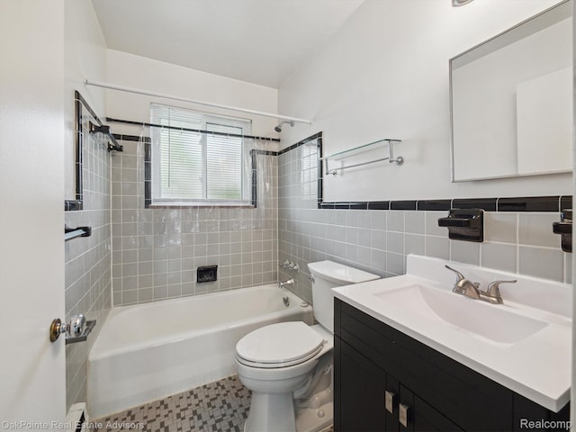 1010 Laprairie St, Ferndale, MI 48220 - bathroom featuring  shower combination, vanity, tile walls, and wainscoting