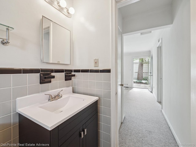 1010 Laprairie St, Ferndale, MI 48220 - bathroom with vanity, tile walls, and wainscoting