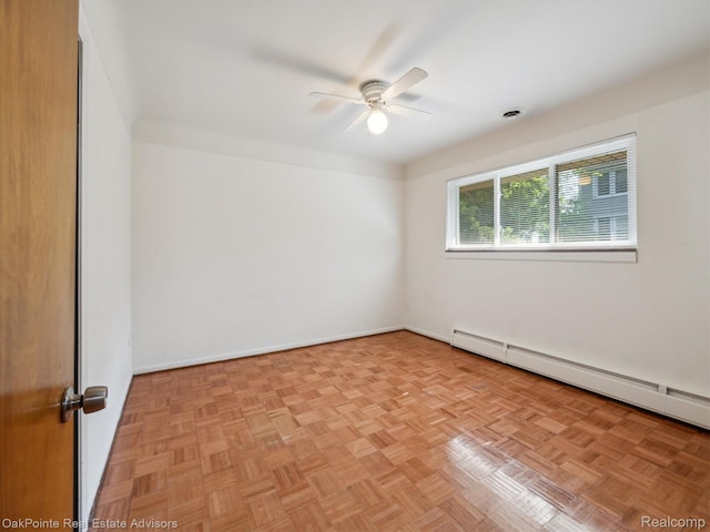 1010 Laprairie St, Ferndale, MI 48220 - spare room with ceiling fan and a baseboard heating unit