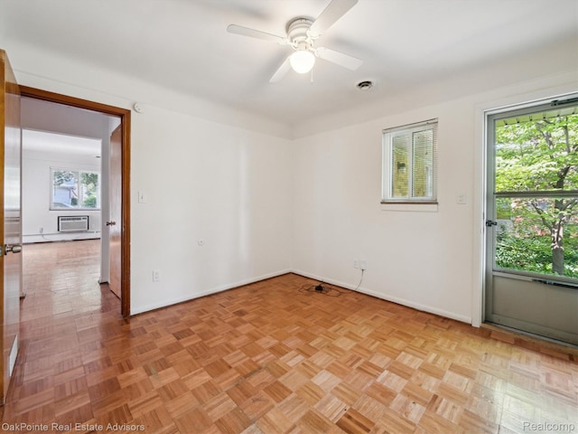 1010 Laprairie St, Ferndale, MI 48220 - spare room featuring a ceiling fan and an AC wall unit