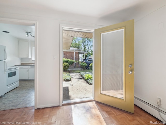 1010 Laprairie St, Ferndale, MI 48220 - doorway to outside featuring a baseboard radiator and baseboards