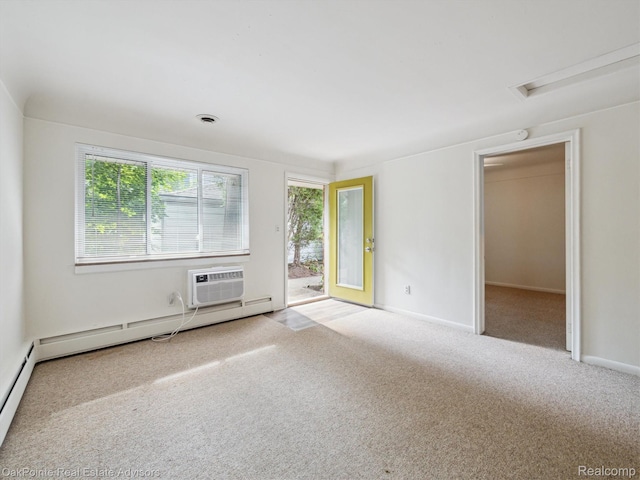 1010 Laprairie St, Ferndale, MI 48220 - spare room with carpet flooring, an AC wall unit, baseboard heating, and attic access