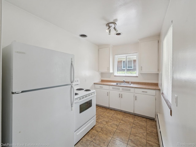 1010 Laprairie St, Ferndale, MI 48220 - kitchen featuring white appliances, a baseboard heating unit, white cabinets, and light countertops