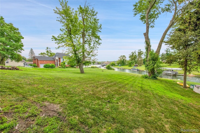 3870 Benstein Rd, Commerce Twp, MI 48382 - view of green lawn with a water view