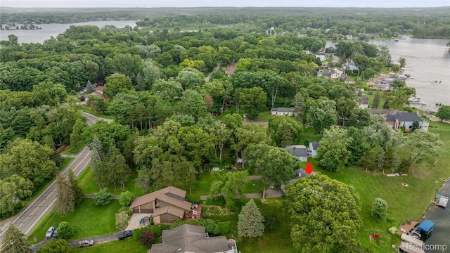 3870 Benstein Rd, Commerce Twp, MI 48382 - aerial view of property's location featuring a nearby body of water and a forest