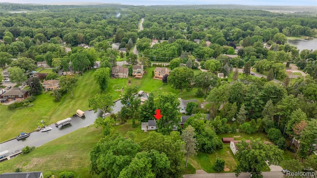 3870 Benstein Rd, Commerce Twp, MI 48382 - aerial perspective of suburban area featuring a nearby body of water