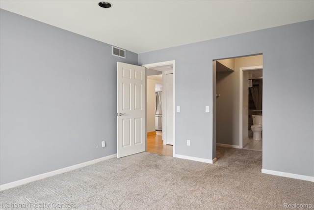 3559 Port Cove Dr Unit 17, Waterford, MI 48328 - unfurnished bedroom with carpet flooring and freestanding refrigerator