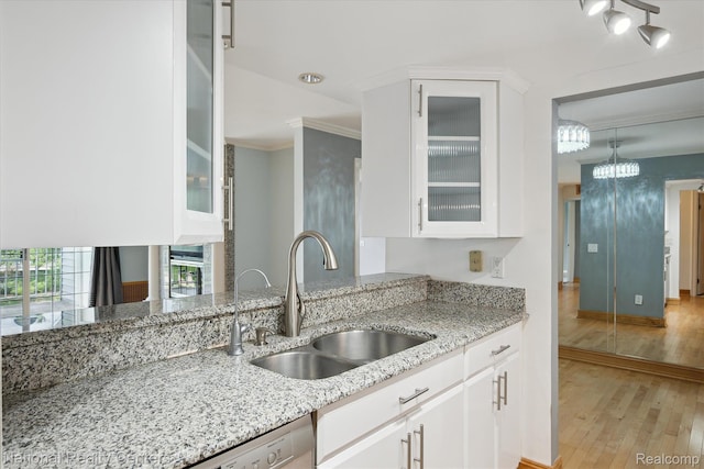 3559 Port Cove Dr Unit 17, Waterford, MI 48328 - kitchen featuring light wood-style flooring, white cabinetry, crown molding, light stone countertops, and glass insert cabinets