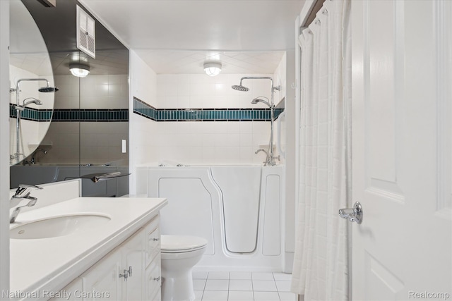 3559 Port Cove Dr Unit 17, Waterford, MI 48328 - full bath featuring tile patterned flooring, vanity, a shower with curtain, a bathtub, and tile walls