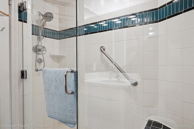 3559 Port Cove Dr Unit 17, Waterford, MI 48328 - bathroom featuring a stall shower