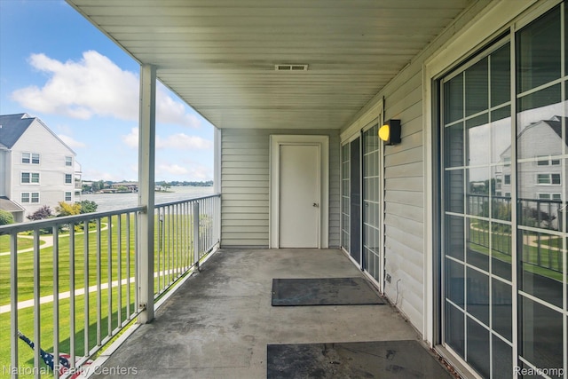 3559 Port Cove Dr Unit 17, Waterford, MI 48328 - balcony featuring a water view