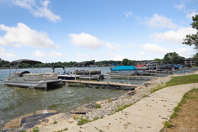 3559 Port Cove Dr Unit 17, Waterford, MI 48328 - dock area featuring a water view