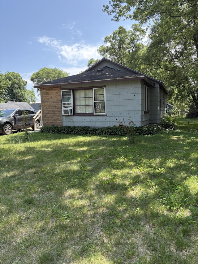 2062 Hatch Ave, Benton Harbor, MI 49022 - view of property exterior with a lawn
