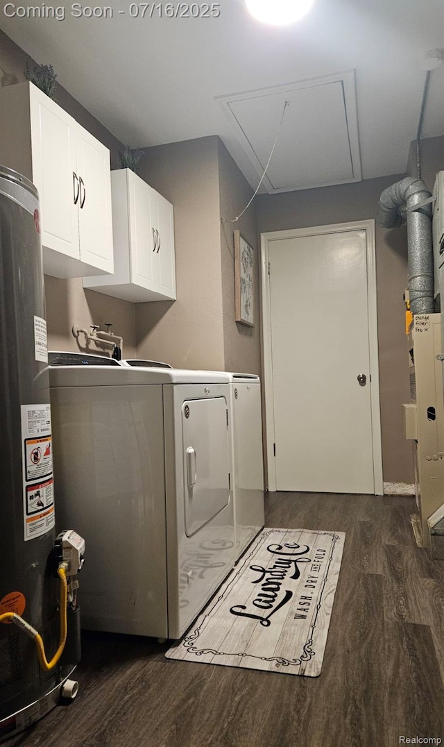 27315 Gilbert Dr, Warren, MI 48093 - laundry room featuring washing machine and dryer, gas water heater, dark wood-type flooring, cabinet space, and attic access
