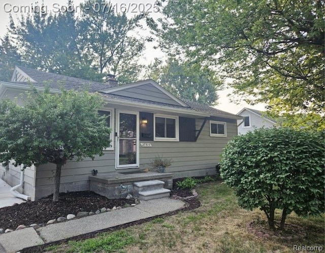 27315 Gilbert Dr, Warren, MI 48093 - view of front of home with roof with shingles and a chimney