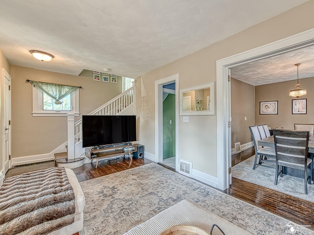 525 Godfroy Ave, Monroe, MI 48162 - living room featuring stairway and wood finished floors