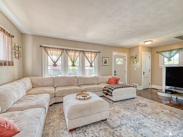 525 Godfroy Ave, Monroe, MI 48162 - living area featuring dark wood-style floors and baseboards