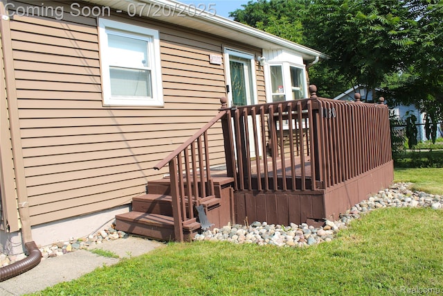 1030 Meida St, Flint, MI 48532 - deck with a lawn