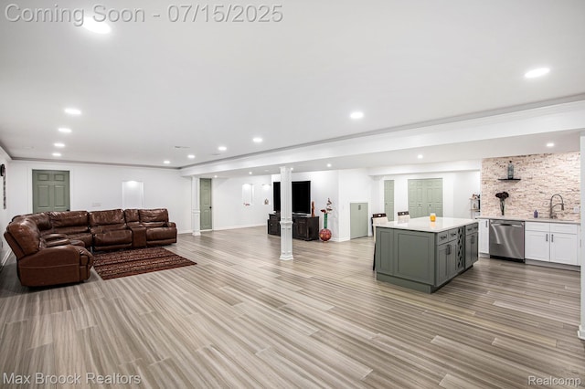 23395 Stoneleigh Ct, South Lyon, MI 48178 - living room with recessed lighting and light wood finished floors