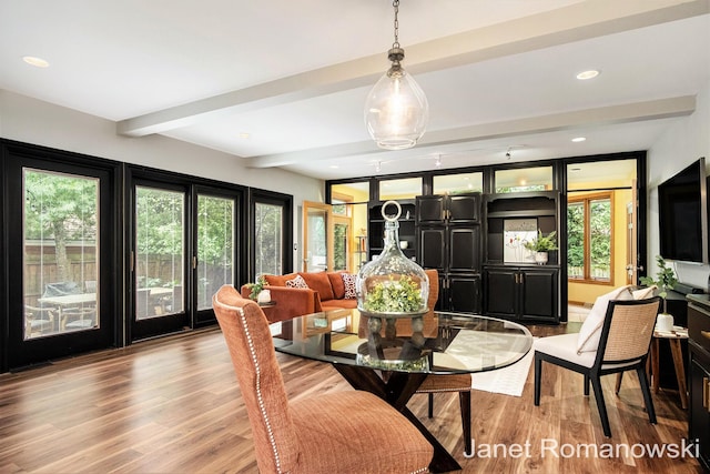 1055 San Lucia Dr SE, Grand Rapids, MI 49506 - dining space with beam ceiling, healthy amount of natural light, light wood-type flooring, and recessed lighting