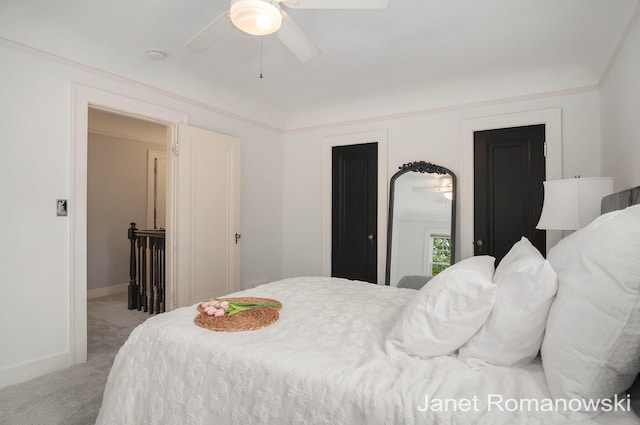 1055 San Lucia Dr SE, Grand Rapids, MI 49506 - carpeted bedroom featuring baseboards and ceiling fan