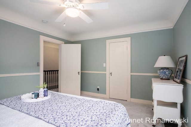 1055 San Lucia Dr SE, Grand Rapids, MI 49506 - carpeted bedroom with a ceiling fan and ornamental molding