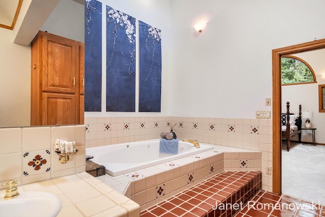1055 San Lucia Dr SE, Grand Rapids, MI 49506 - full bathroom featuring a garden tub and tile patterned floors