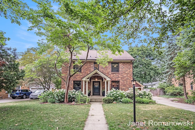 1055 San Lucia Dr SE, Grand Rapids, MI 49506 - colonial house with brick siding
