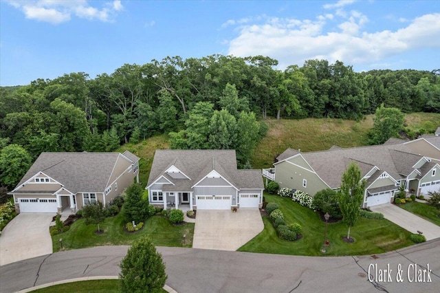 4454 Keena Ct NE Unit 71, Grand Rapids, MI 49525 - aerial perspective of suburban area featuring a heavily wooded area