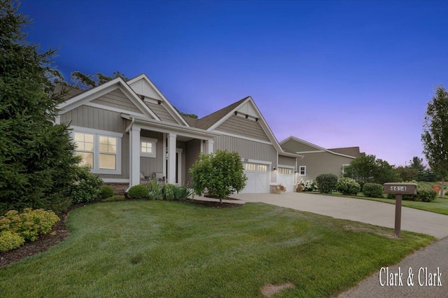 4454 Keena Ct NE Unit 71, Grand Rapids, MI 49525 - craftsman inspired home with a garage, driveway, a lawn, and board and batten siding