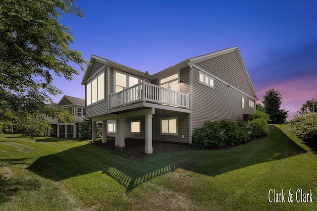 4454 Keena Ct NE Unit 71, Grand Rapids, MI 49525 - rear view of house featuring a yard and a wooden deck