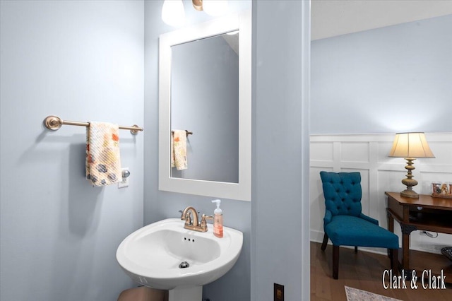 4454 Keena Ct NE Unit 71, Grand Rapids, MI 49525 - bathroom with a decorative wall, a wainscoted wall, and wood finished floors
