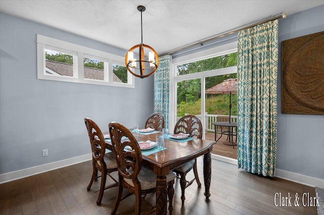 4454 Keena Ct NE Unit 71, Grand Rapids, MI 49525 - dining area with a chandelier, healthy amount of natural light, and wood-type flooring