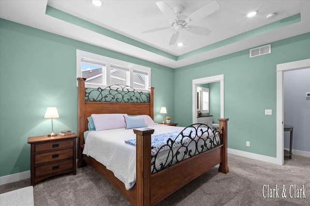 4454 Keena Ct NE Unit 71, Grand Rapids, MI 49525 - carpeted bedroom with a tray ceiling, recessed lighting, a ceiling fan, and connected bathroom