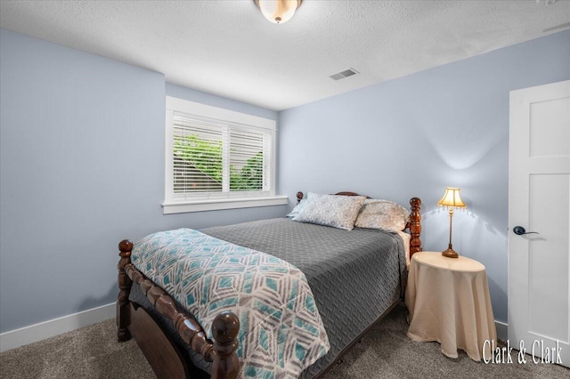 4454 Keena Ct NE Unit 71, Grand Rapids, MI 49525 - carpeted bedroom featuring baseboards and a textured ceiling