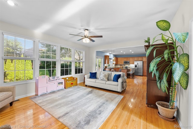 1760 Bedlington Ct, Rochester Hills, MI 48307 - living room featuring ceiling fan, light wood-style flooring, plenty of natural light, and recessed lighting