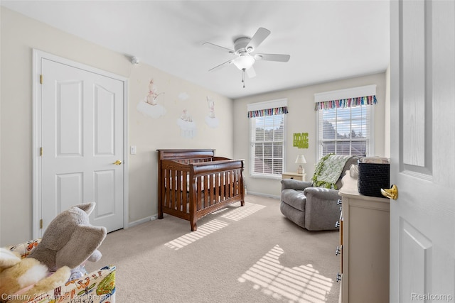 1760 Bedlington Ct, Rochester Hills, MI 48307 - bedroom with a nursery area, light colored carpet, and ceiling fan