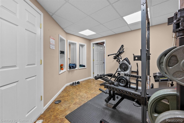 1760 Bedlington Ct, Rochester Hills, MI 48307 - exercise area featuring a drop ceiling and baseboards