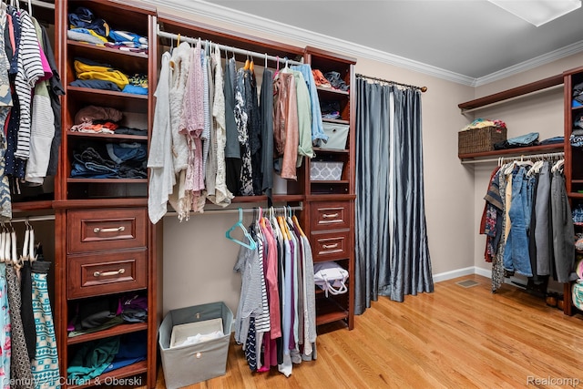 1760 Bedlington Ct, Rochester Hills, MI 48307 - spacious closet featuring wood finished floors