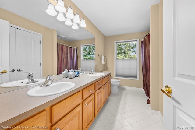 1760 Bedlington Ct, Rochester Hills, MI 48307 - bathroom featuring double vanity, tile patterned floors, and curtained shower