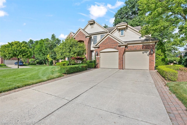 1760 Bedlington Ct, Rochester Hills, MI 48307 - view of front of house featuring brick siding, concrete driveway, a front yard, and a garage
