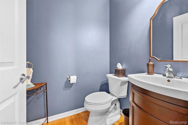 1760 Bedlington Ct, Rochester Hills, MI 48307 - half bathroom with vanity and wood finished floors