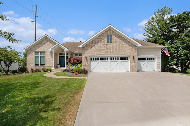 172 Bay Meadows Dr, Holland, MI 49424 - view of front of home with brick siding, concrete driveway, an attached garage, and a front lawn